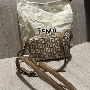 Fendi Bag 

FF monogram-embroidered raffia bag (Authentic)